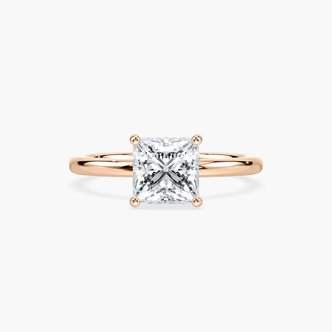 Delicate Four-Prong Princess Cut Solitaire Engagement Ring