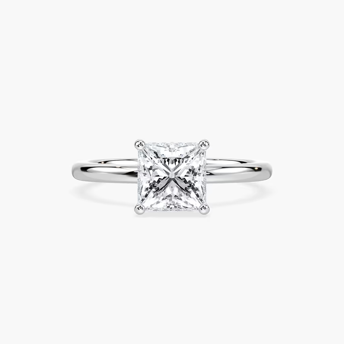 Delicate Four-Prong Princess Cut Solitaire Engagement Ring