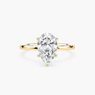 Delicate Four-Prong Pear Shaped Solitaire Engagement Ring