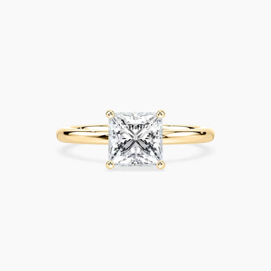 Delicate Four-Prong Princess Cut Solitaire Engagement Ring
