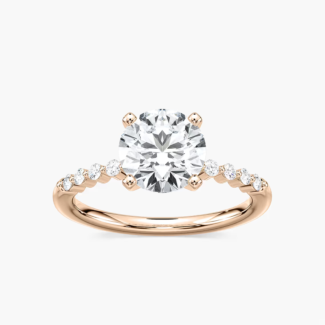 Round Cut Shared Prong Side Stone Engagement Ring