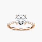 Round Cut Shared Prong Side Stone Engagement Ring