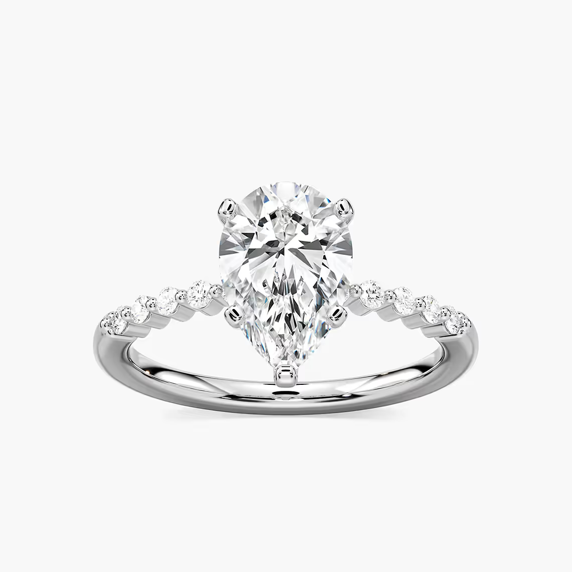 Pear Shaped Shared Prong Side Stone Engagement Ring