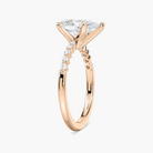Pear Shaped Shared Prong Side Stone Engagement Ring