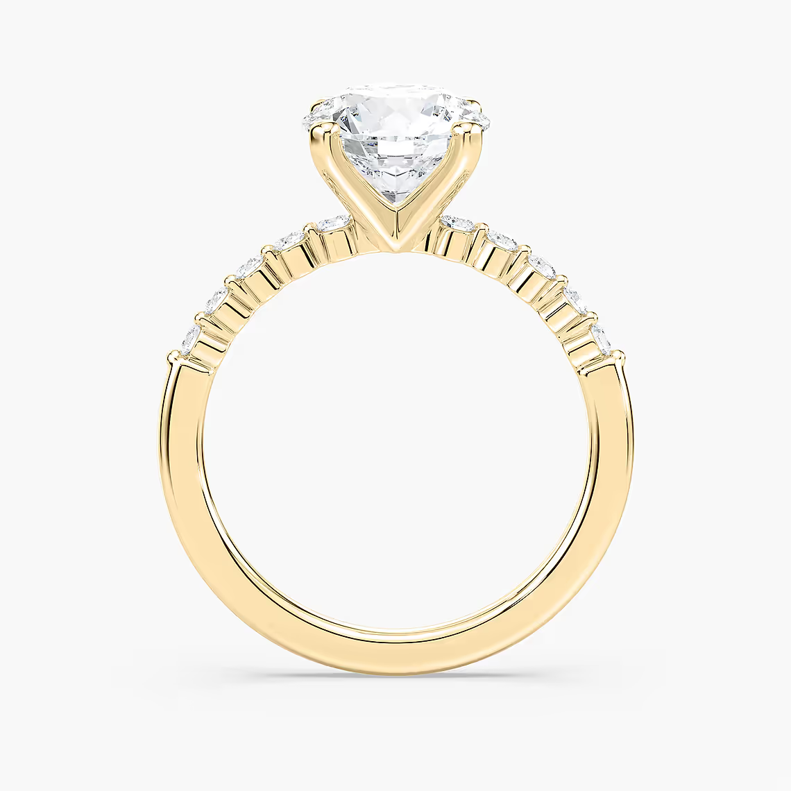 Round Cut Shared Prong Side Stone Engagement Ring