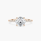 Round Cut Shared Prong Side Stone Engagement Ring