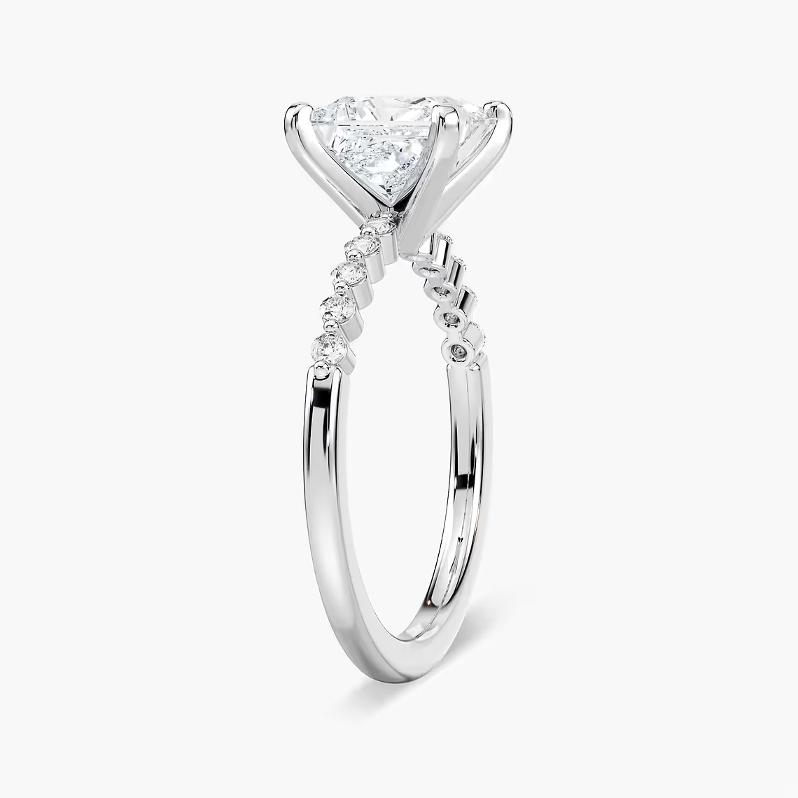 Princess Cut Shared Prong Side Stone Engagement Ring