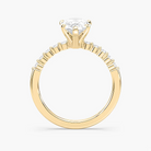 Pear Shaped Shared Prong Side Stone Engagement Ring