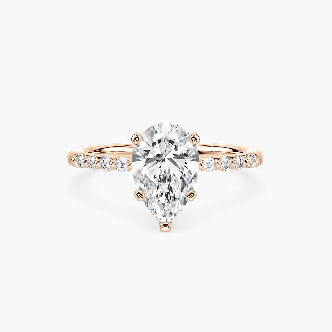 Pear Shaped Shared Prong Side Stone Engagement Ring